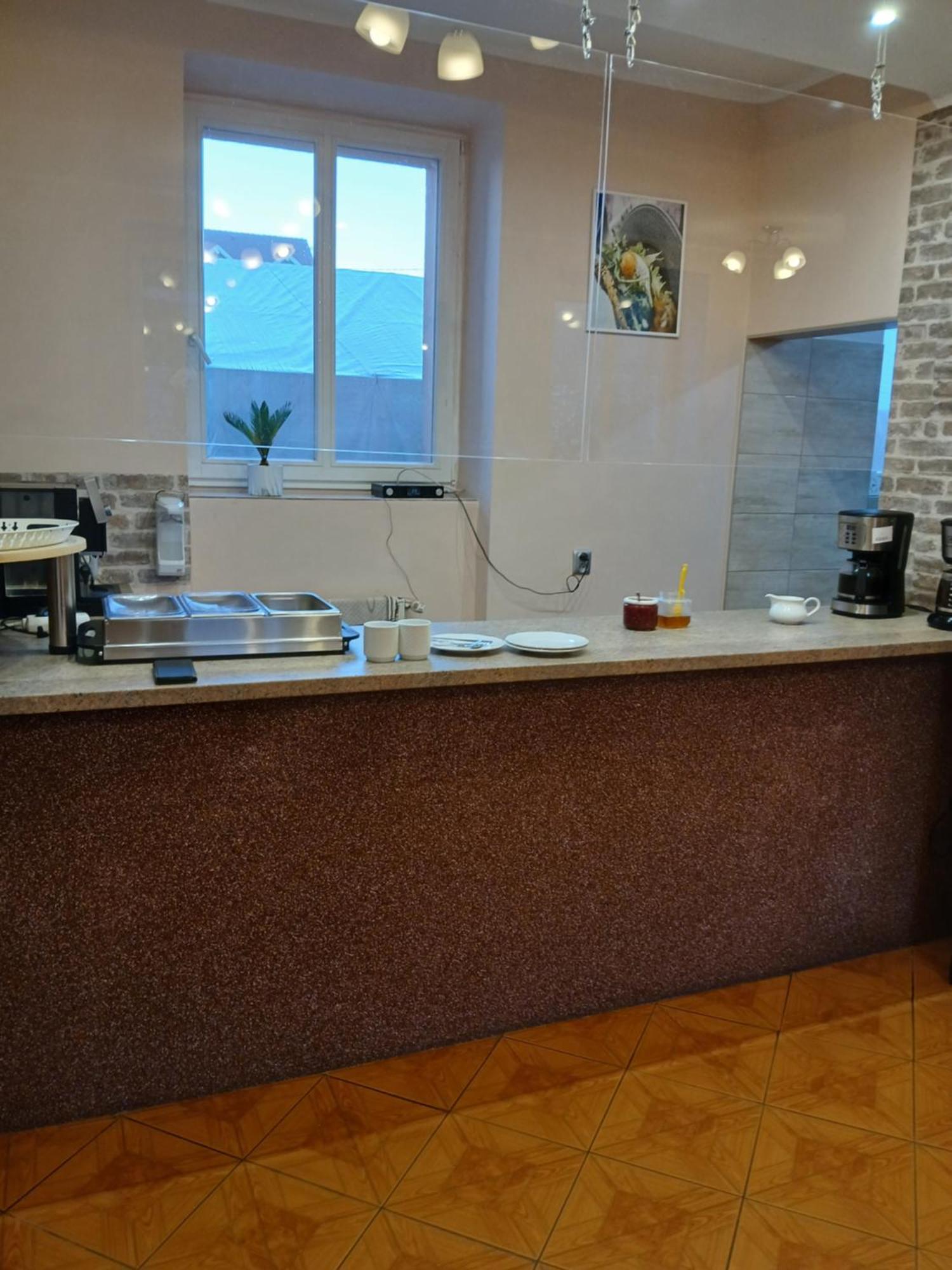 Dom Brama Mazur Acomodação com café da manhã Ostróda Exterior foto